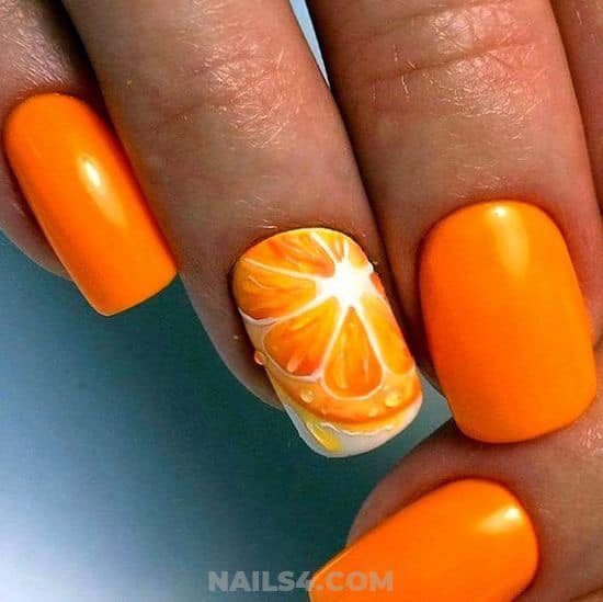 оранжев маникюр  с портокали