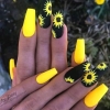жълти нокти със слънчогледи.jpg