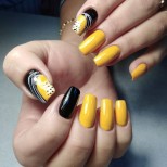 сочен маникюр черно и жълто