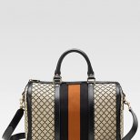Текстилна чанта тип куфарче с кожена лента в средата Gucci Есен-Зима 2011