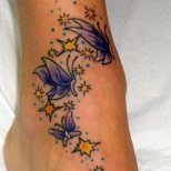 Татуировка стилизирани пеперуди на крака