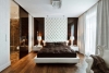 Апартамент в Полша с топъл интериор и земна цветова палитра